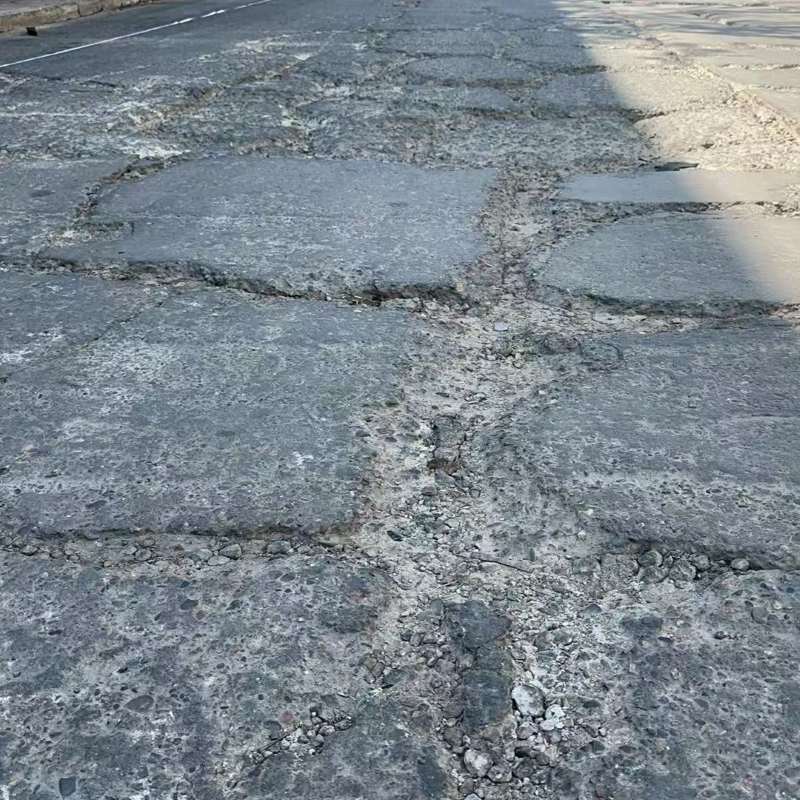 西城路面起砂露石子修补料